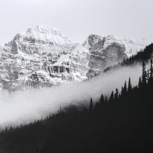 Morning fog settles into mountain valley in the Canadian Rocky Mountains. B&W handcrafted alternative process photograph (original silver emulsion print from paper negative). "Rockies Valley Fog" © WJ Eastman. Offered by GALLERY5X7.