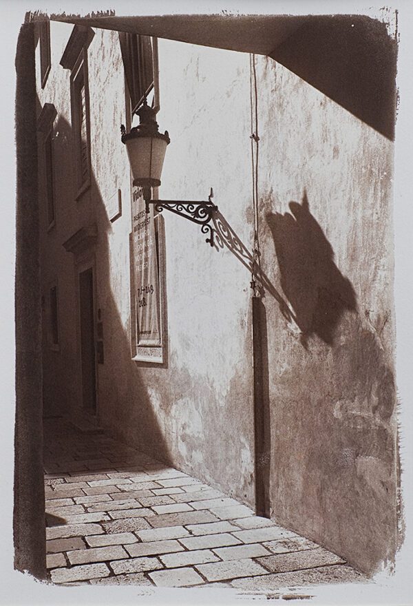 "Croatia Side Street" © Alan Glover. Approx 11x7.5” handcrafted Van Dyke Brown print from a single negative printed on Hahnemuhle Platinum Rag paper. GALLERY5X7 offers this original print, signed on the mount (mount size 16x12”).
