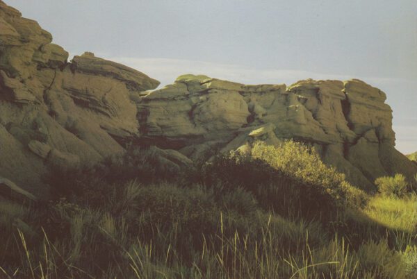 “Toadstool Geologic Park Nebraska" © Tom Wise. Toadstool Geologic Park in Oglala National Grassland Sioux County Nebraska. Approx. 14x21" (35.6x53.3cm) handcrafted alternative process photograph (gum bichromate over cyanotype). GALLERY5X7 offers this signed, original print.