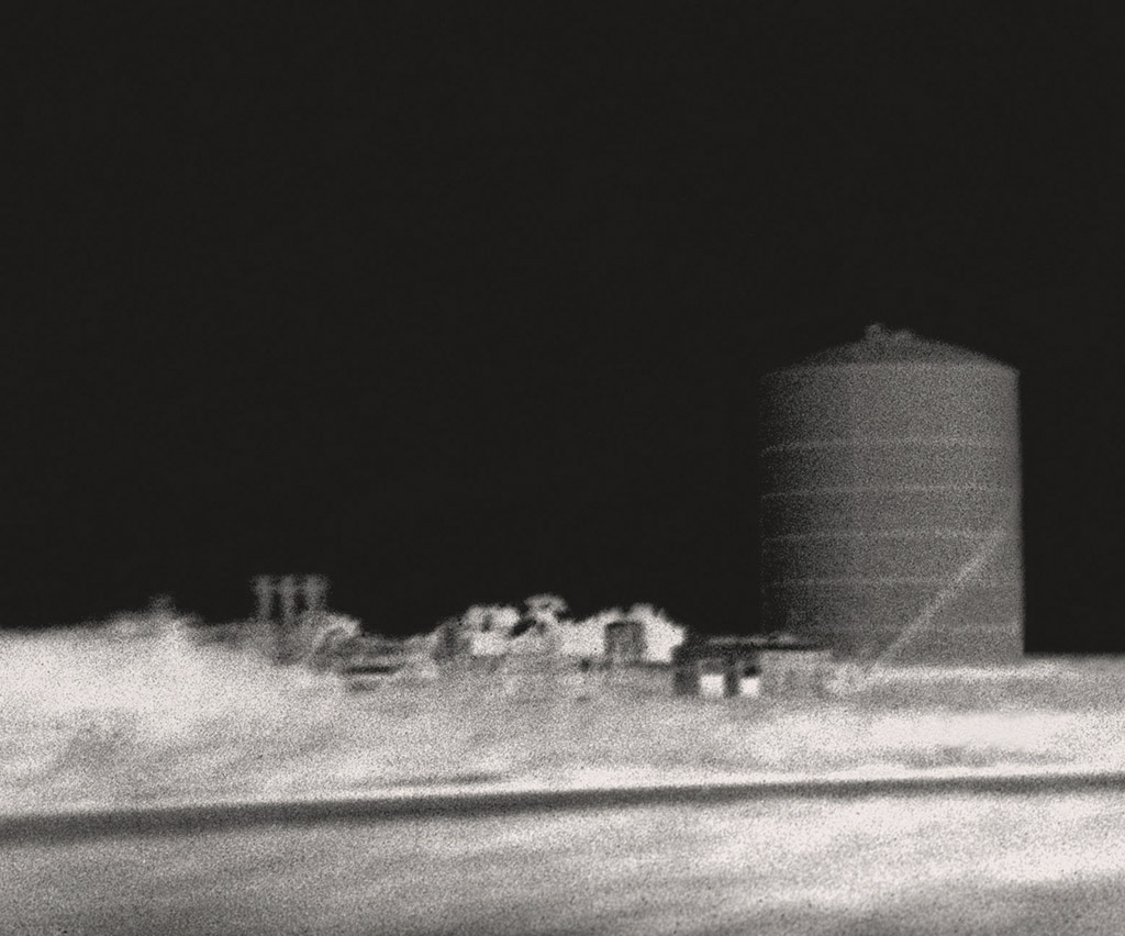 "Silo” © Marc Sirinsky. Approx. 7.5x9" handcrafted silver gelatin print from from antique bakelite camera negative. Original, signed, editioned (1/10) print offered at $250.