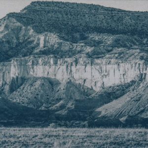 “Ghost Ranch, NM.” Ghost Ranch, Rio Arriba County, NM. Approx. 4x10" (10x25cm) handcrafted alternative process photograph (toned cyanotype, pyrogallic acid). Original, signed, editioned print offered by GALLERY5X7.